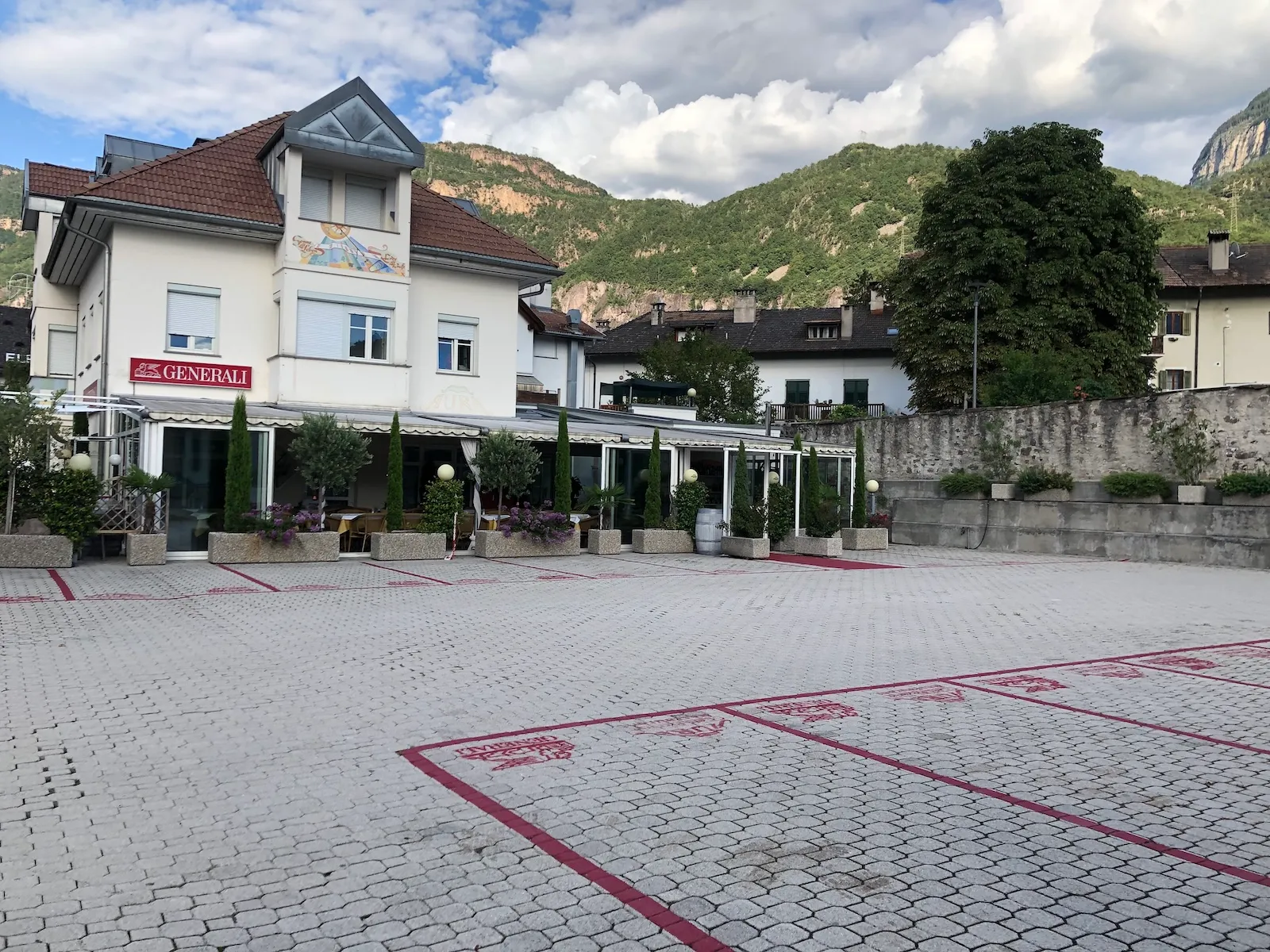 Pizzeria Aura exterior with warm lighting